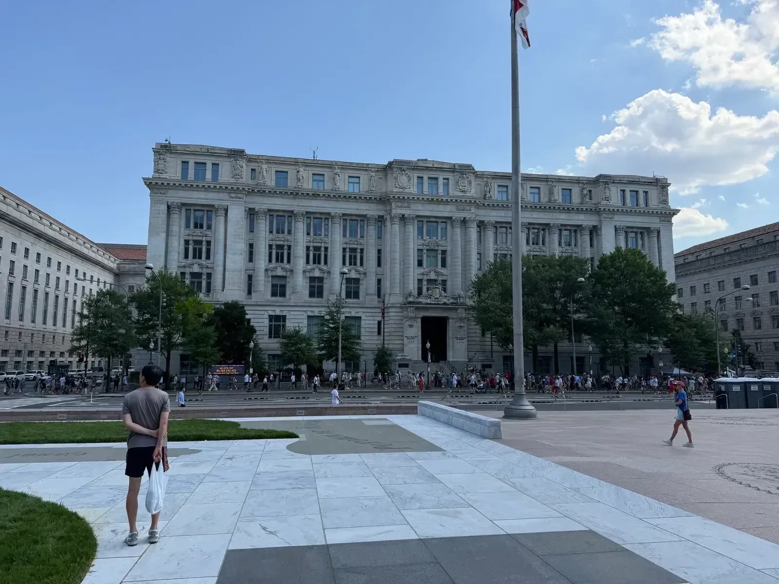 Crowds lining Constitution Avenue in Washington DC during the July 4, 2026 heat wave