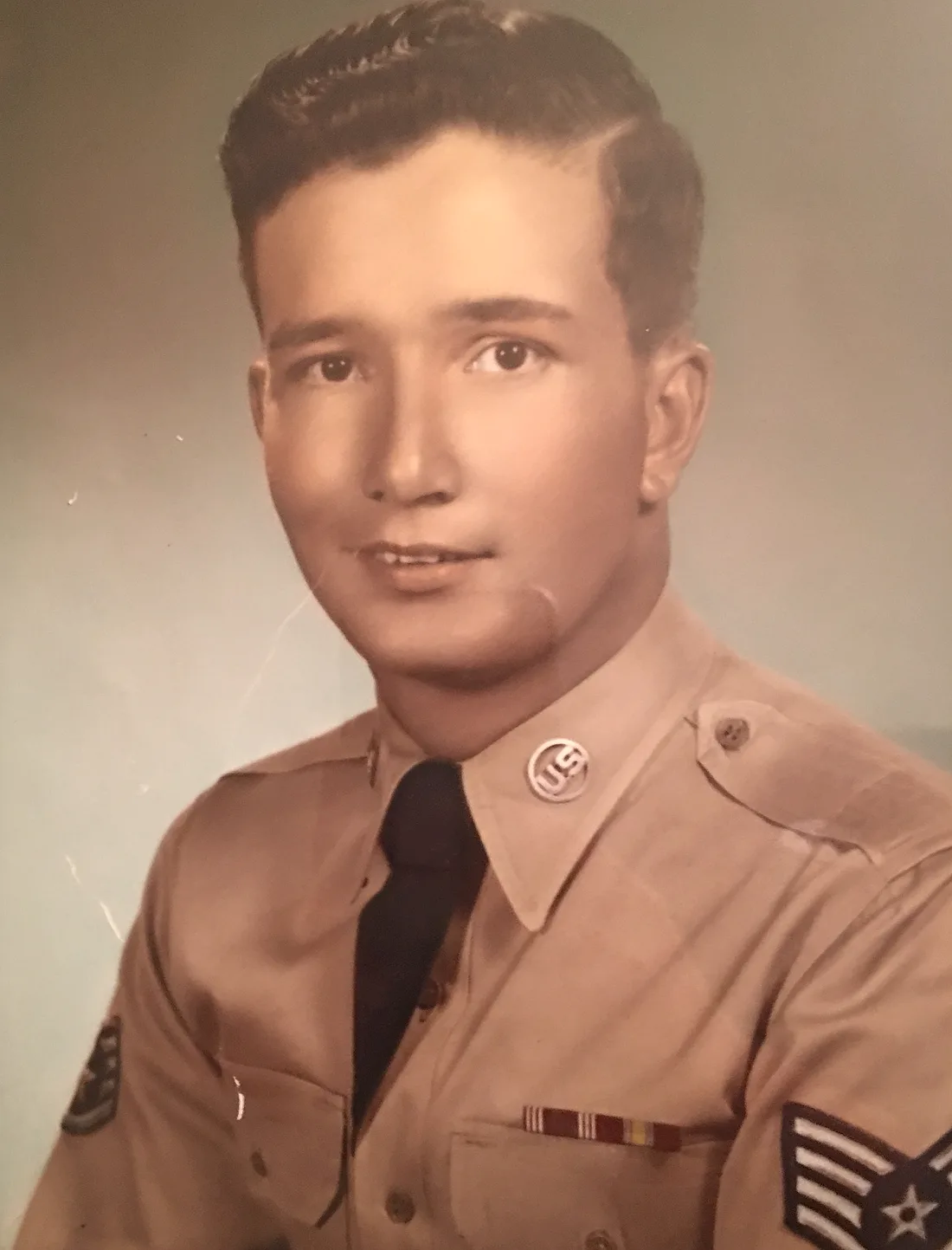 Brison McPhail's grandfather in his official U.S. Air Force portrait wearing Staff Sergeant stripes