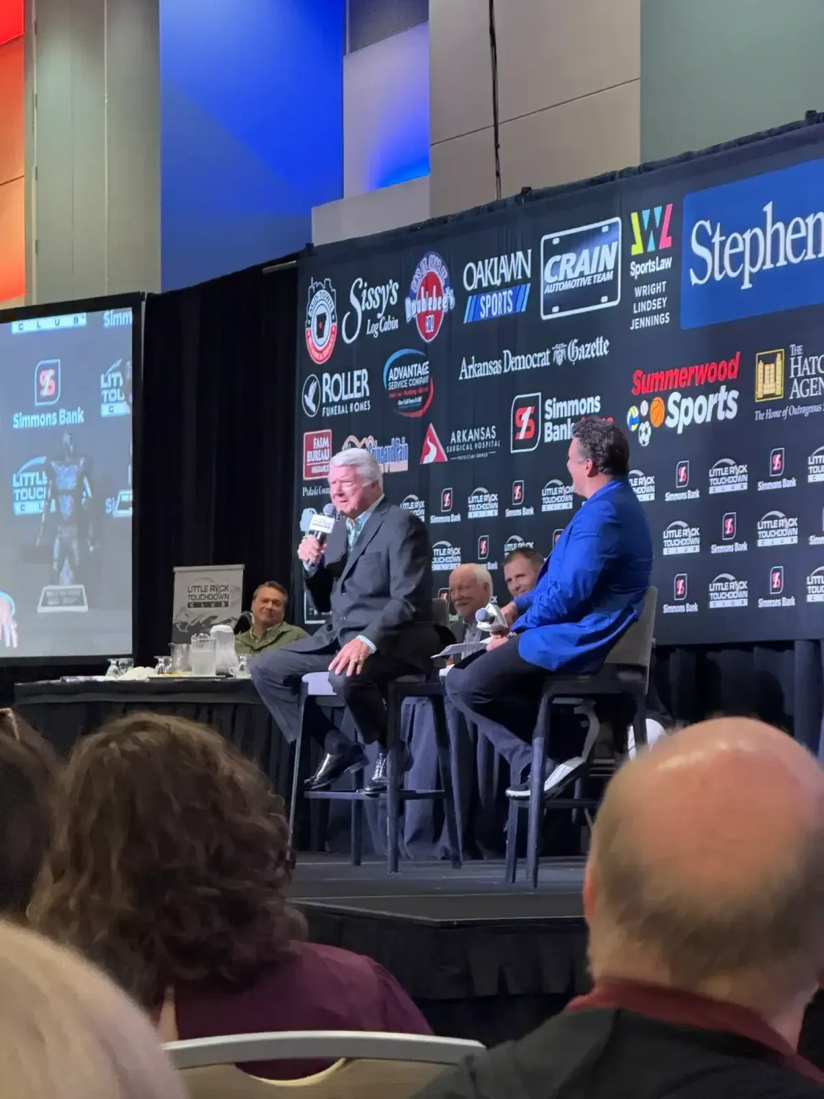 Jimmy Johnson on stage taking questions at the Little Rock Touchdown Club luncheon