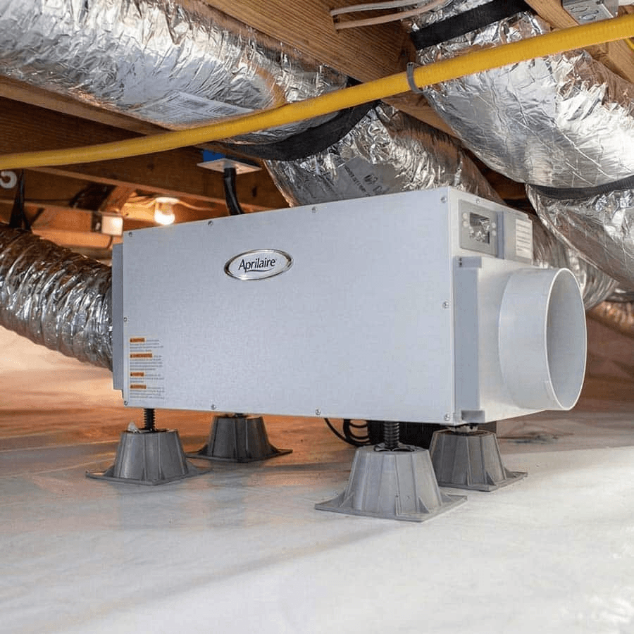 Aprilaire whole-home dehumidifier installed in attic with HVAC ductwork